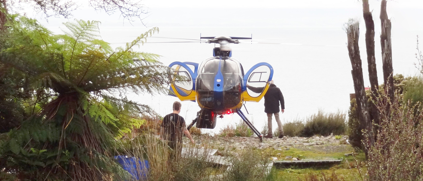 Murray Radka arrives by helicopter at Port Craig